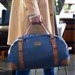Bolso de viaje azul FERCCINI Portofino Navy con tres manijas y herrajes metálicos