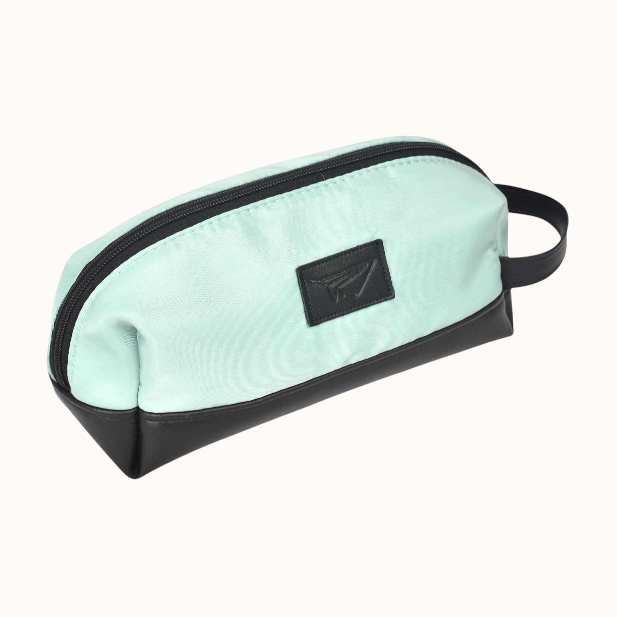 Neceser FERCCINI Minori Paradiso en verde menta con base y asa en sintético negro y emblema aplicado